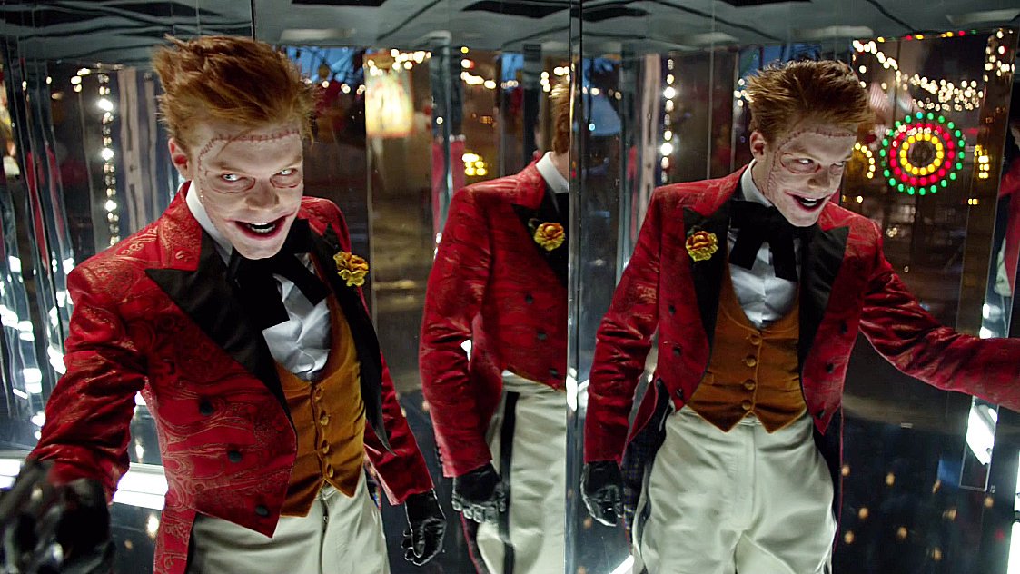 The joker standing in a hall of mirrors.