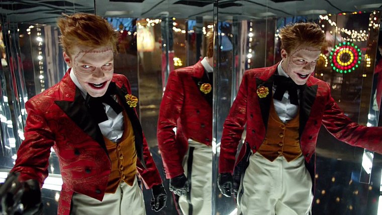 The joker standing in a hall of mirrors.